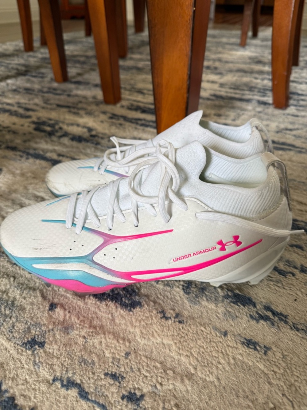 Under Armour White football Cleats with Pink and Teal Accents